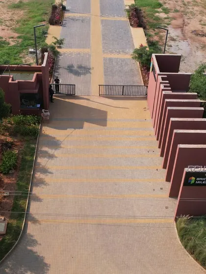 The entrance to a new layout development in Bangalore sets the tone for the entire community. The design uses a series of architectural fins and carefully selected planting to create a strong sense of arrival.