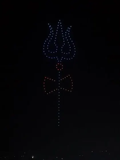 A Trishul formation against the night sky at the Chintpurni Festival. This symbol of Lord Shiva's power was a highlight of our spiritual drone show.