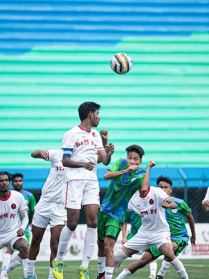 An aerial duel during a match. Our players are trained to be dominant in all aspects of the game, including set-pieces and high balls.
