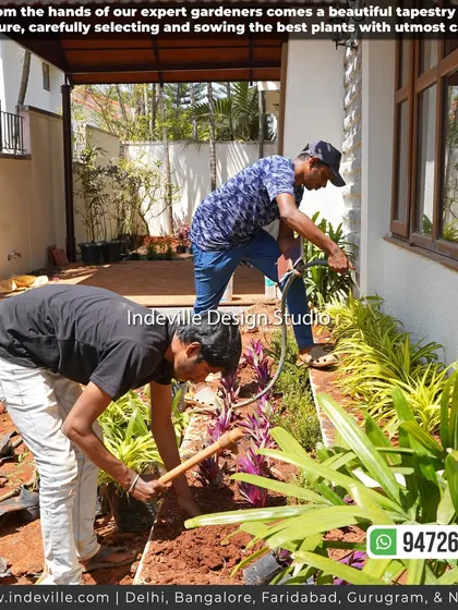 My expert gardeners at work, carefully selecting and sowing plants. This image captures the hands-on care and horticultural knowledge that goes into every garden I create.