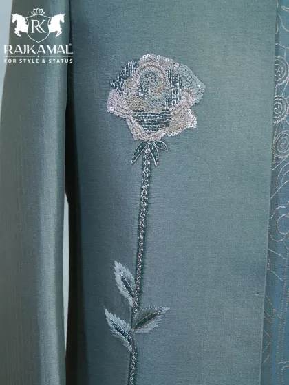 A close-up of the sequined rose motif on the pastel green Indo-Western jacket, a testament to my focus on unique, artistic details.