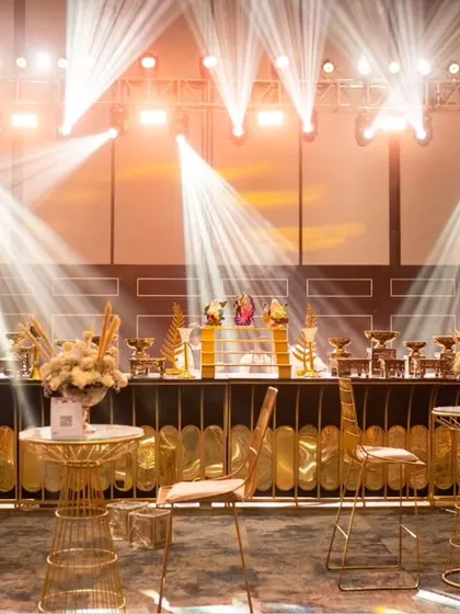 An opulent gold and black bar is the centerpiece of this glamorous Sangeet.
