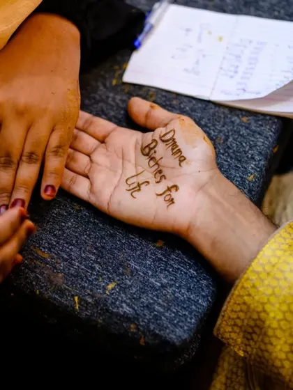 The mehendi that caused all the laughter. It's these personal, funny details that make a wedding unique.