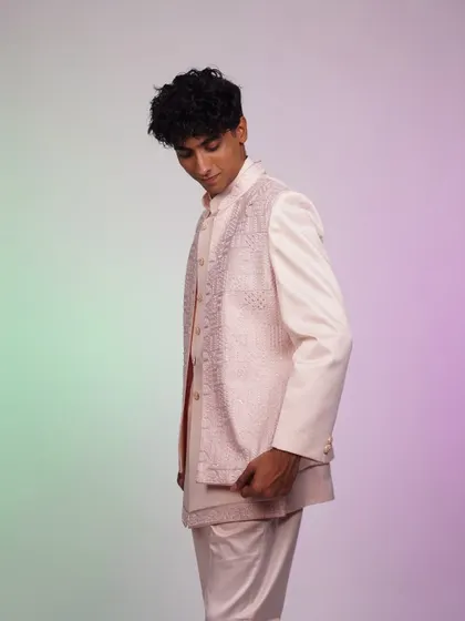 A side view of the pink Indo-western set, showing off its unique layered design.