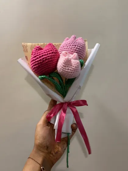 Three shades of pink in one sweet bouquet. This arrangement of crochet tulips in light, medium, and dark pink is simple, elegant, and so pretty.