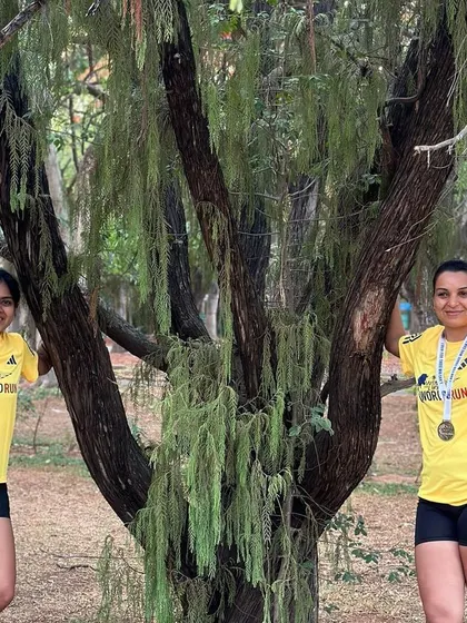 Two runners celebrating their achievement. Every finish line crossed is a victory.