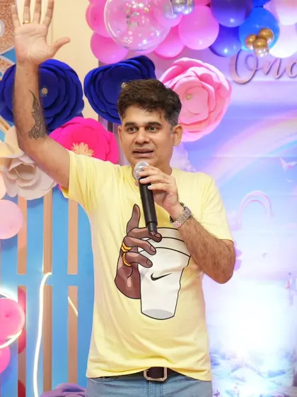 Addressing the crowd at a princess-themed birthday party. I can tailor my announcements and hosting to fit any theme.