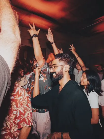 A happy face in the crowd, lost in the music. This is why I throw these parties.