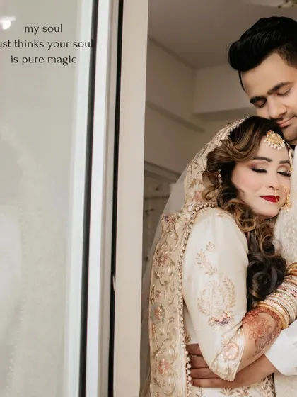 A romantic embrace between the bride and groom, with a poetic quote overlayed, enhancing the emotional depth of the image.
