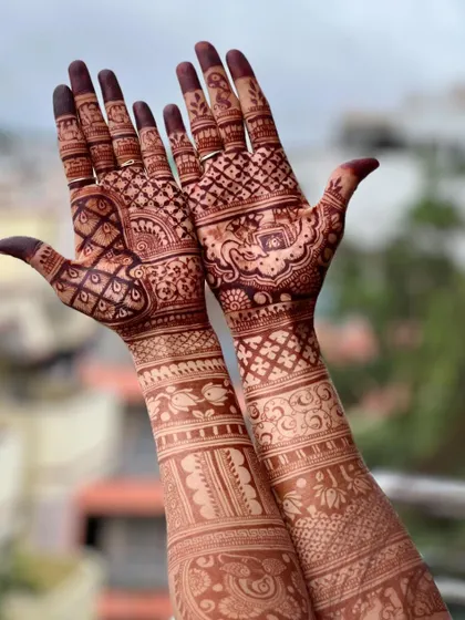 The full two-arm view of the bridal design, showing the beautiful stain and intricate details.