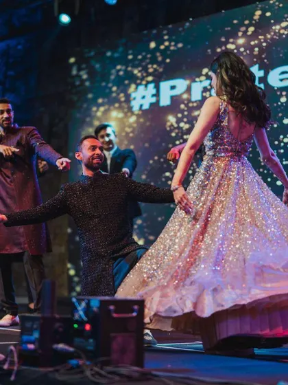 The best moments are when the dance is filled with pure, unscripted emotion. This groom's playful dip during their group performance became one of the most memorable parts of the night.