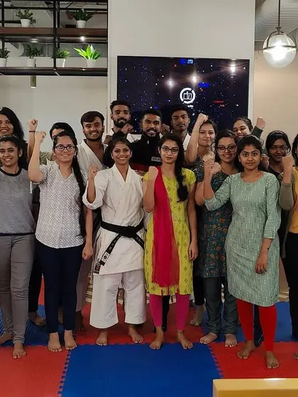 The full group from the Zerofox self-defense program, united and empowered.