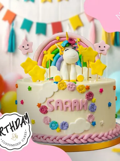 A delightful unicorn cake decorated with stars, clouds, and a rainbow. The personalized name and colorful details make it a truly special and magical birthday treat.