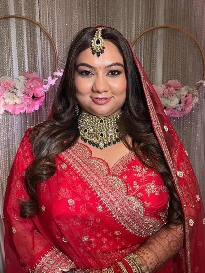 A portrait of a timeless bride. Her confidence shines through with this elegant makeup, featuring a perfectly blended base and eyes that captivate.