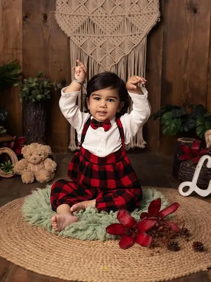 Look at those dance moves! This playful shot perfectly captures the fun and energy of a toddler photoshoot. I always encourage them to be themselves and have a good time.