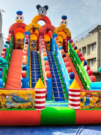 This 4-slider bouncy features detailed underwater and jungle-themed artwork on the front panels. The bright colors and multiple activities make it a favorite for kids.