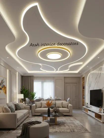 This is the kind of grand statement a living room deserves. I designed this flowing, multi-layered false ceiling with integrated cove lighting to create a luxurious and spacious feel, making it the centerpiece of the entire home.
