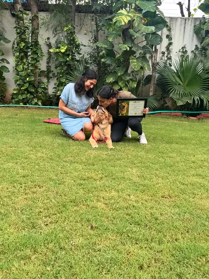 A sweet kiss for Milly on her graduation day. These moments are what make all the hard work worth it.