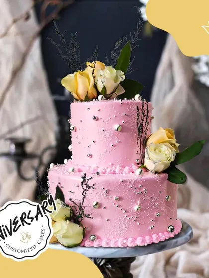 This lovely pink two-tier cake helped Aashay and Tanushree celebrate their anniversary in Safdarjung. The fresh yellow roses and silver sugar pearls add a touch of modern elegance.