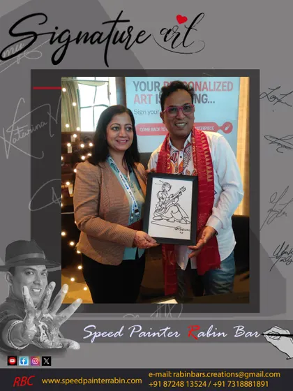 Another satisfied client from the Delhi event, holding her personalized artwork that started from her own signature.