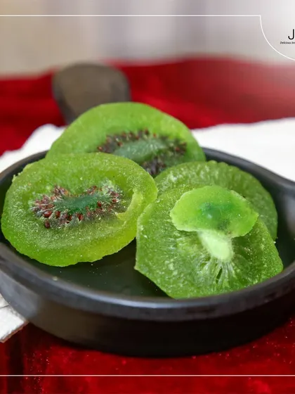 Balancing sweet and sour delights. A close-up of candied kiwi, representing the unique and quality ingredients we use.