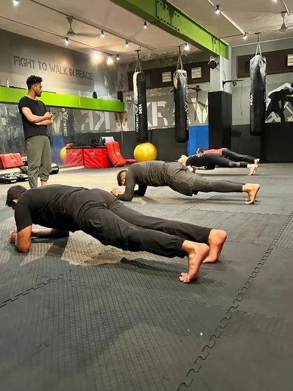 I am always watching, ensuring proper form and pushing my students to hold on for that extra second. This discipline in training is what builds true mental and physical fortitude.
