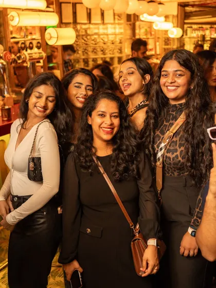 The crowd at VIBE CHECK is always ready for a good time. All smiles from this group of friends enjoying the throwback anthems.
