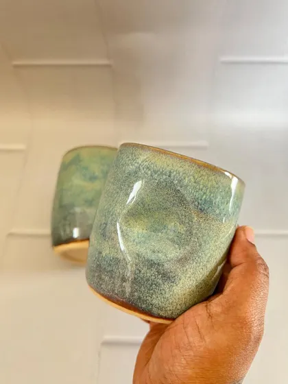 These turquoise grip mugs have a soft, gentle color that reminds me of the sea. The ergonomic design makes them a joy to use.