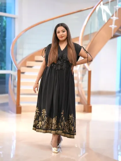 Another portrait from the Fracto Prop launch, highlighting the detailed gold embroidery on my dress. This fusion of modern style with traditional elements is part of my signature look.