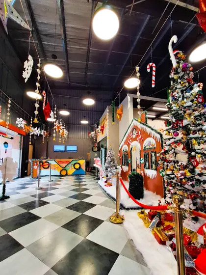The checkered floors of our entrance hall decked out for a Christmas party, creating a festive welcome.