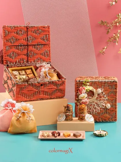 Another look at our orange jute hampers, showing one open to reveal the contents. These boxes are designed to be reusable, extending the life of your thoughtful gift.