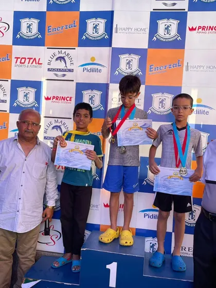 The podium at the Matunga Gymkhana swim meet, with our swimmer Bryce securing second place in the breaststroke event. Our program focuses on developing race-winning techniques for all competitive strokes.