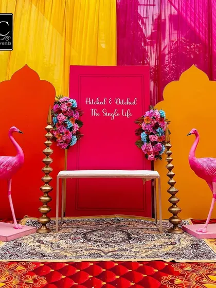 Let's add a touch of fun to your Mehndi. This quirky photo booth with its bright flamingo props and a playful "Hitched & Ditched The Single Life" sign was a huge hit and created so many fun memories for the guests.