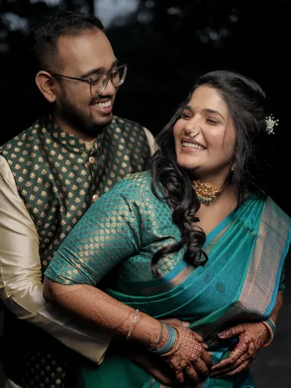 A sweet photo of the couple, both glowing with happiness.