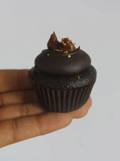 To give you an idea of their size, here is one of my bite-sized mini cupcakes held in my hand. They are perfectly portioned for a small treat or for sampling multiple flavours without feeling too full.