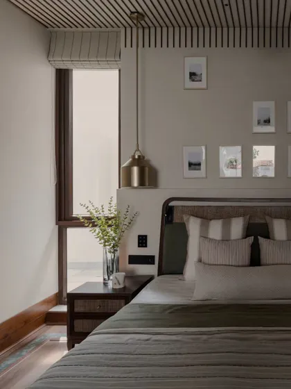 Another view of the bedside, showing how the natural light from the window brightens the room. We always prioritize maximizing daylight in our bedroom designs.