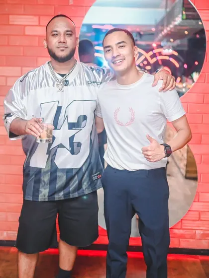 Me with a fan at the club. I always make time to connect with the people who come out to my shows.