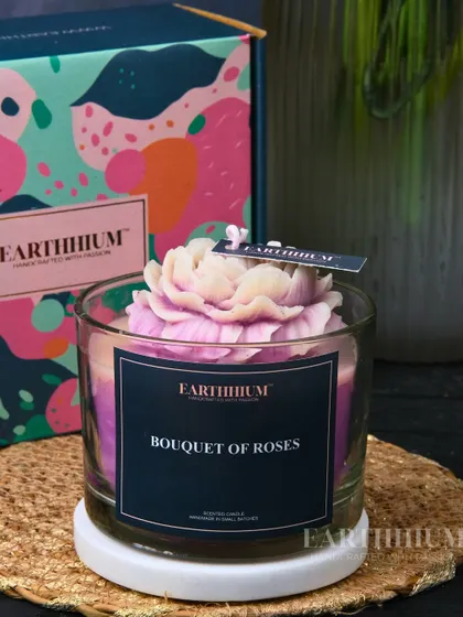 My 'Bouquet of Roses' candle in a classic glass jar, featuring a beautifully sculpted peony on top.