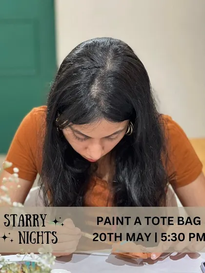 Focused and creative, a guest paints her design onto a tote bag during our Starry Nights event. It's a peaceful and satisfying way to spend an evening.