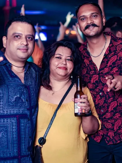 Friends enjoying a drink and the music, part of the amazing crowd at The Fixx.