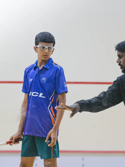 Our coach providing direct feedback to Aryaman Singh during a training session, a key part of our personalized coaching approach.