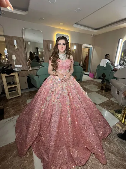This client looks like a princess in her magnificent pink ballgown. The makeup is equally dreamy and glamorous.