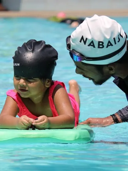 This series shows a complete lesson for our little champion, Anvika. From one-on-one instruction and floating with a noodle to practicing on a kickboard, it’s all about fun and progress.