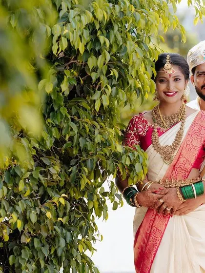 A happy and relaxed portrait of the couple, their love for each other evident in their easy smiles and comfortable embrace.