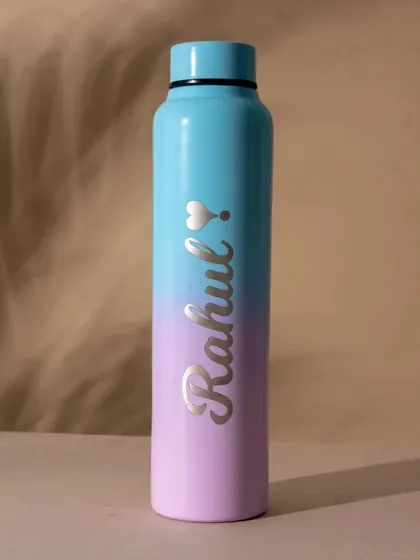 The reverse gradient of the dual-tone bottle, with blue at the top and purple at the bottom. I can add a small charm or icon next to the name for extra personalization.