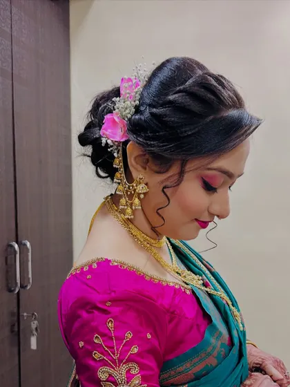 A beautiful profile of the romantic floral updo.