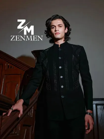 Another shot of the black velvet bandhgala, showing the subtle texture and sharp tailoring from a different angle.