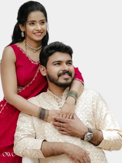 A happy and relaxed couple portrait, perfect for showcasing their comfortable and loving relationship.