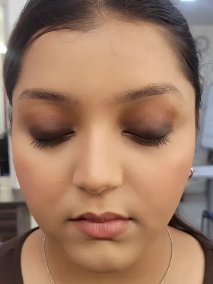 A detailed close-up of the soft brown smokey eye with eyes closed. This shows the gradient of color from dark at the lash line to light in the crease.
