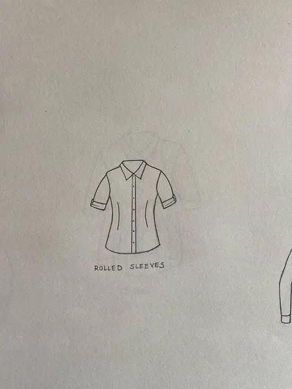 Duplicate of 47. Flat sketches of different shirt and top styles, including V neck, polo, ruffle, and corset shirts.